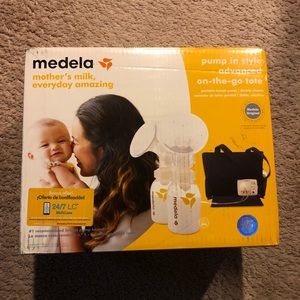 Medela Breastpump and extras